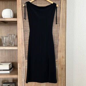 NWOT Stretchable Material Plain Black dress with side slit
